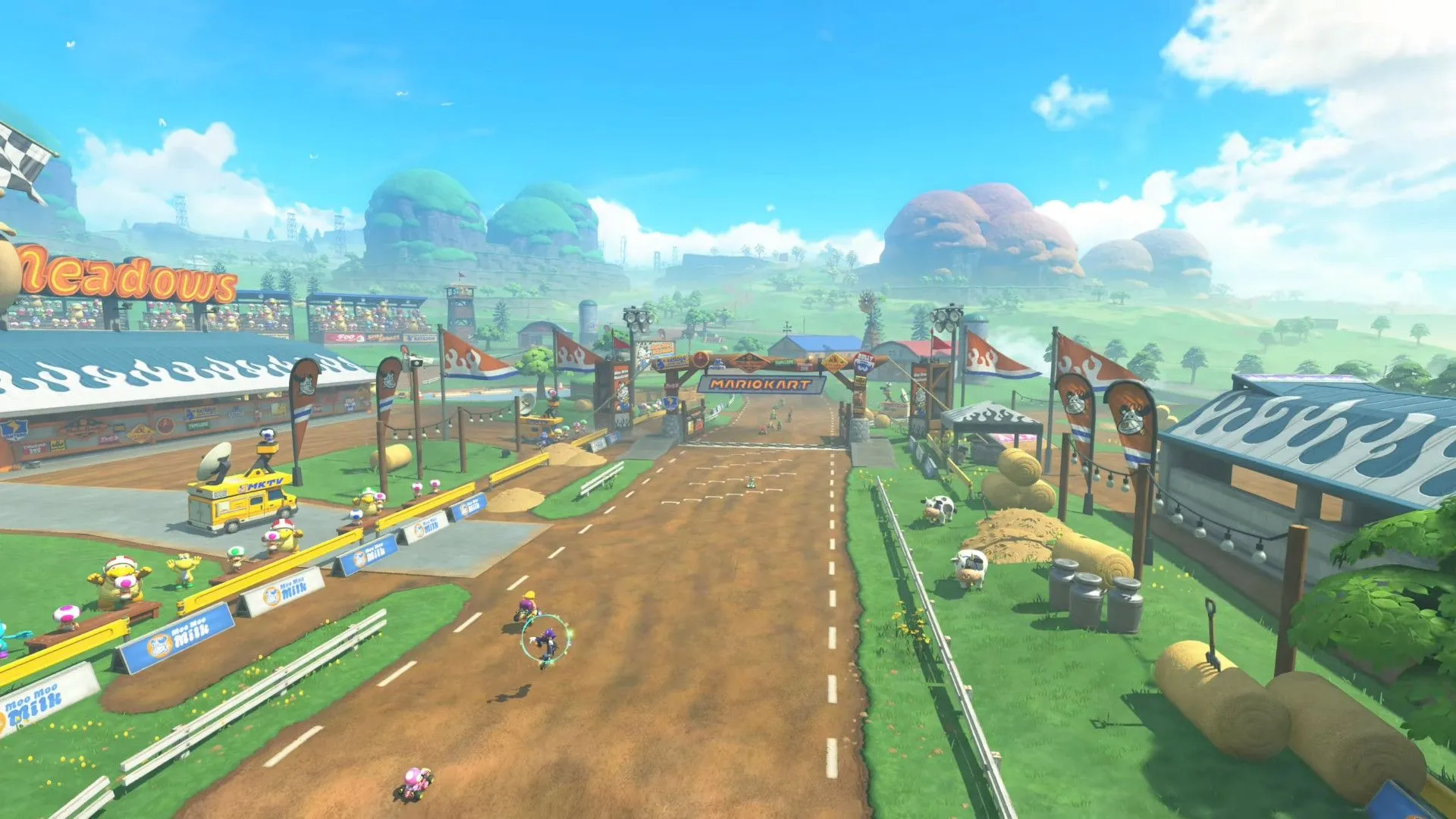Cảnh quay từ trên cao một đường đua trong Mario Kart World, thể hiện thiết kế màn chơi phức tạp và đồ họa sống động.