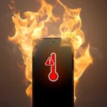 Điện thoại bốc cháy cảnh báo quá nhiệt trong điều kiện nhiệt độ cao, minh họa nguy hiểm khi để thiết bị trong môi trường nóng như xe hơi.