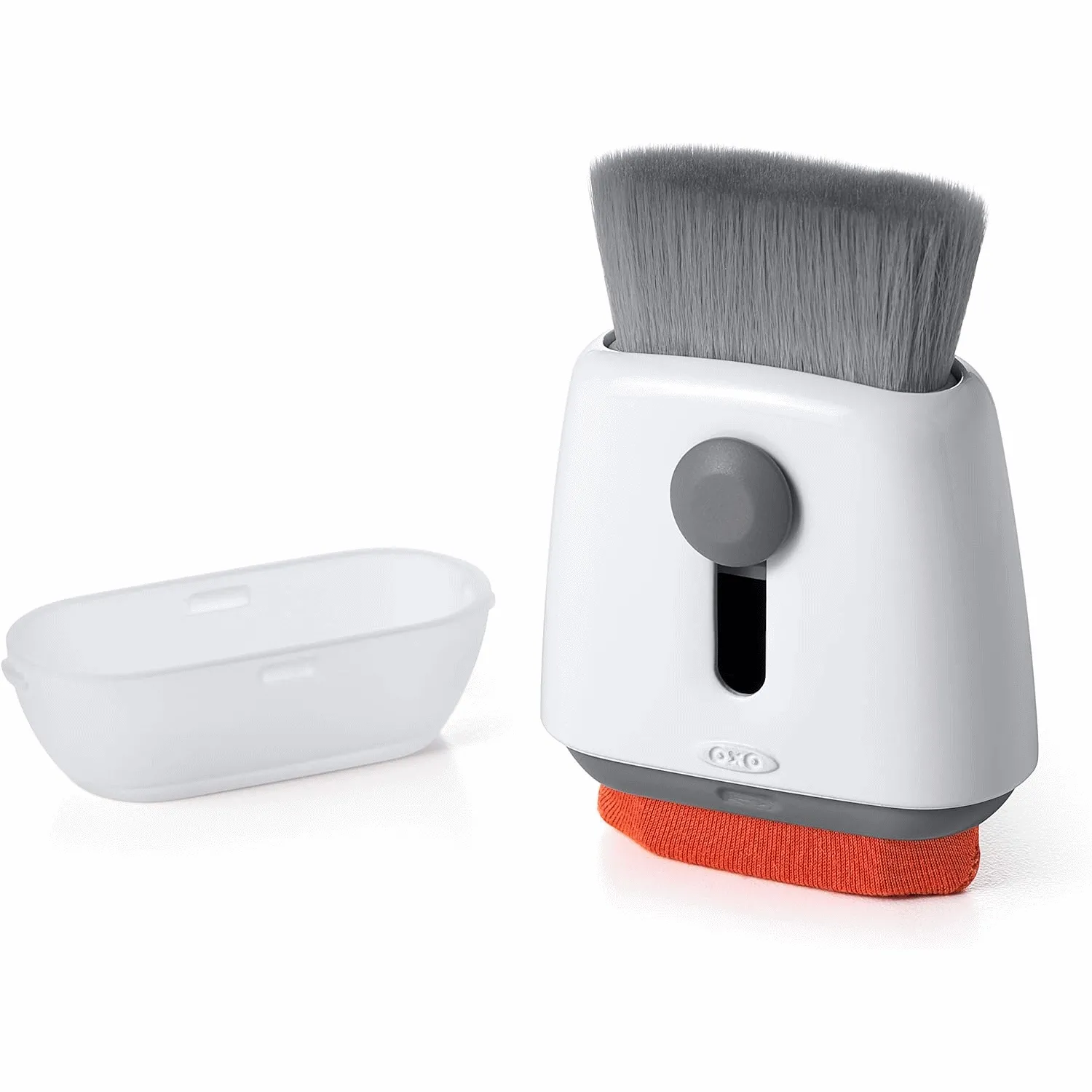 Dụng cụ vệ sinh OXO Good Grips Sweep &amp; Swipe với một đầu chổi và một đầu gạt bụi, lý tưởng cho thiết bị điện tử.