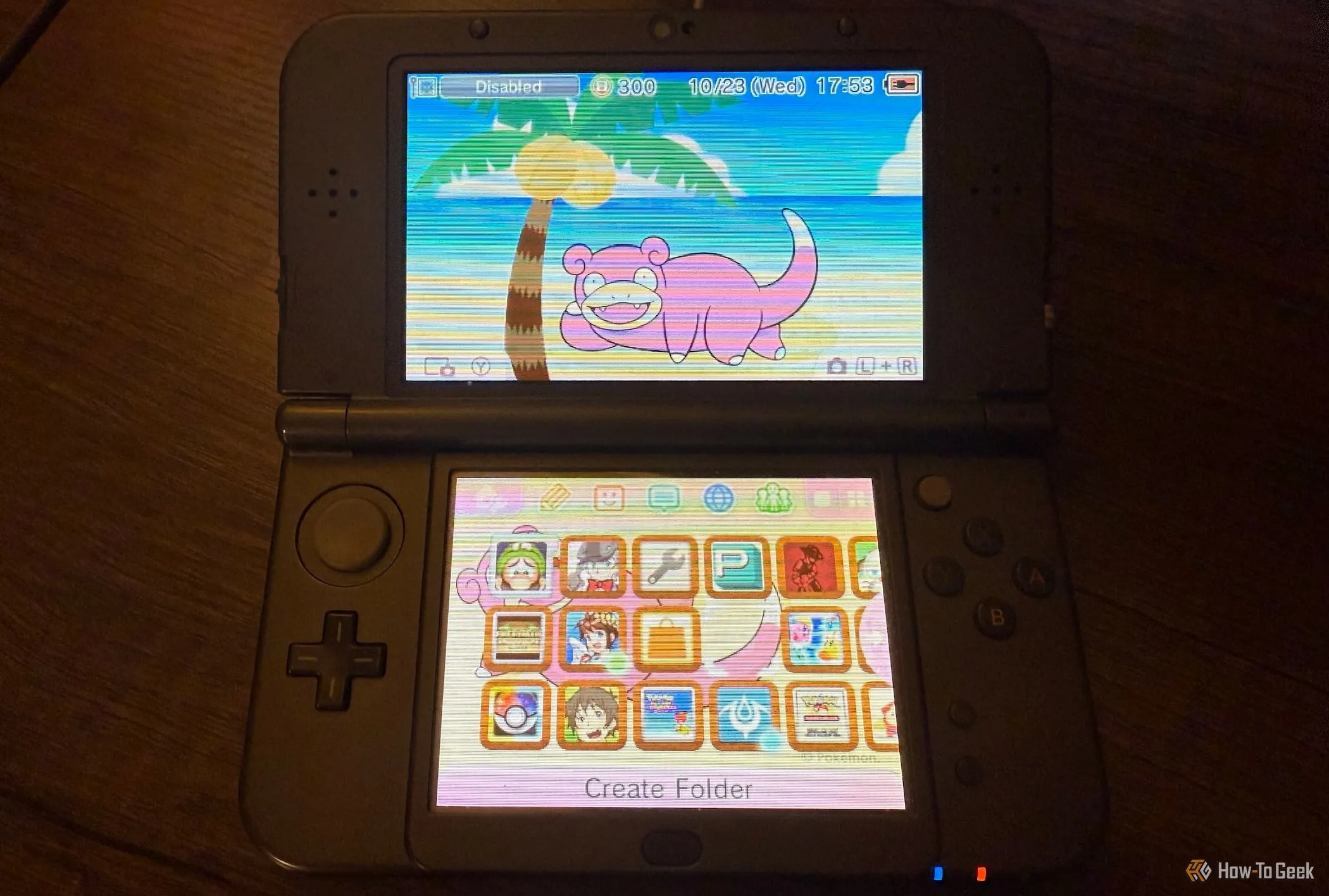 Màn hình chính của New Nintendo 3DS XL với chủ đề Slowpoke.