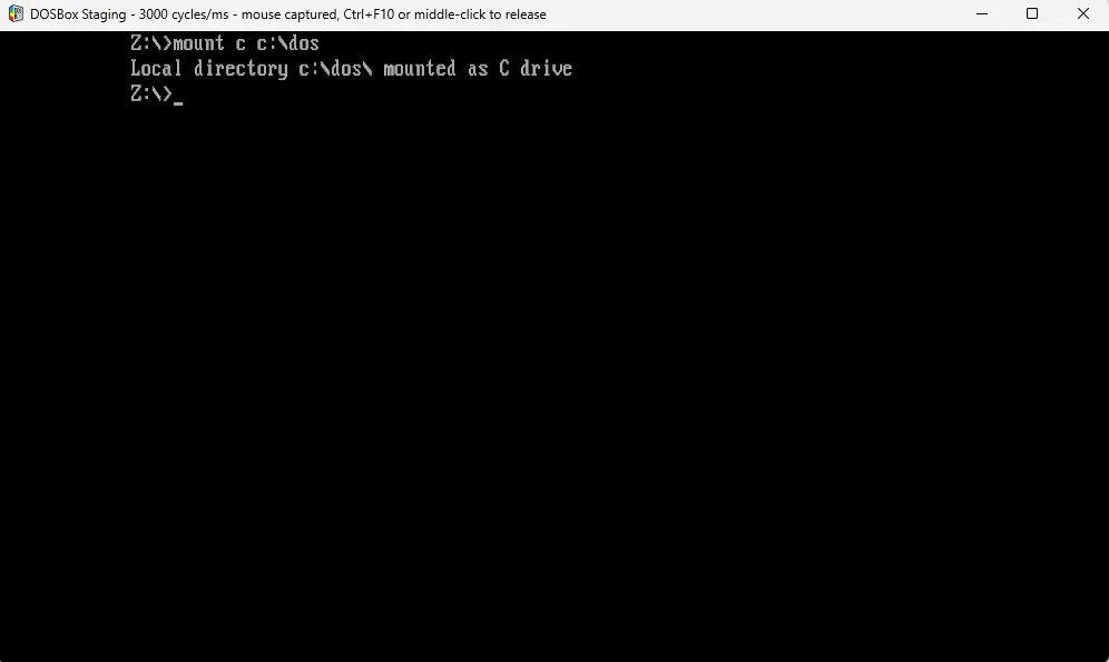 Màn hình DOSBox Staging xác nhận đã mount thành công ổ đĩa C ảo, sẵn sàng cho việc chạy các ứng dụng DOS.