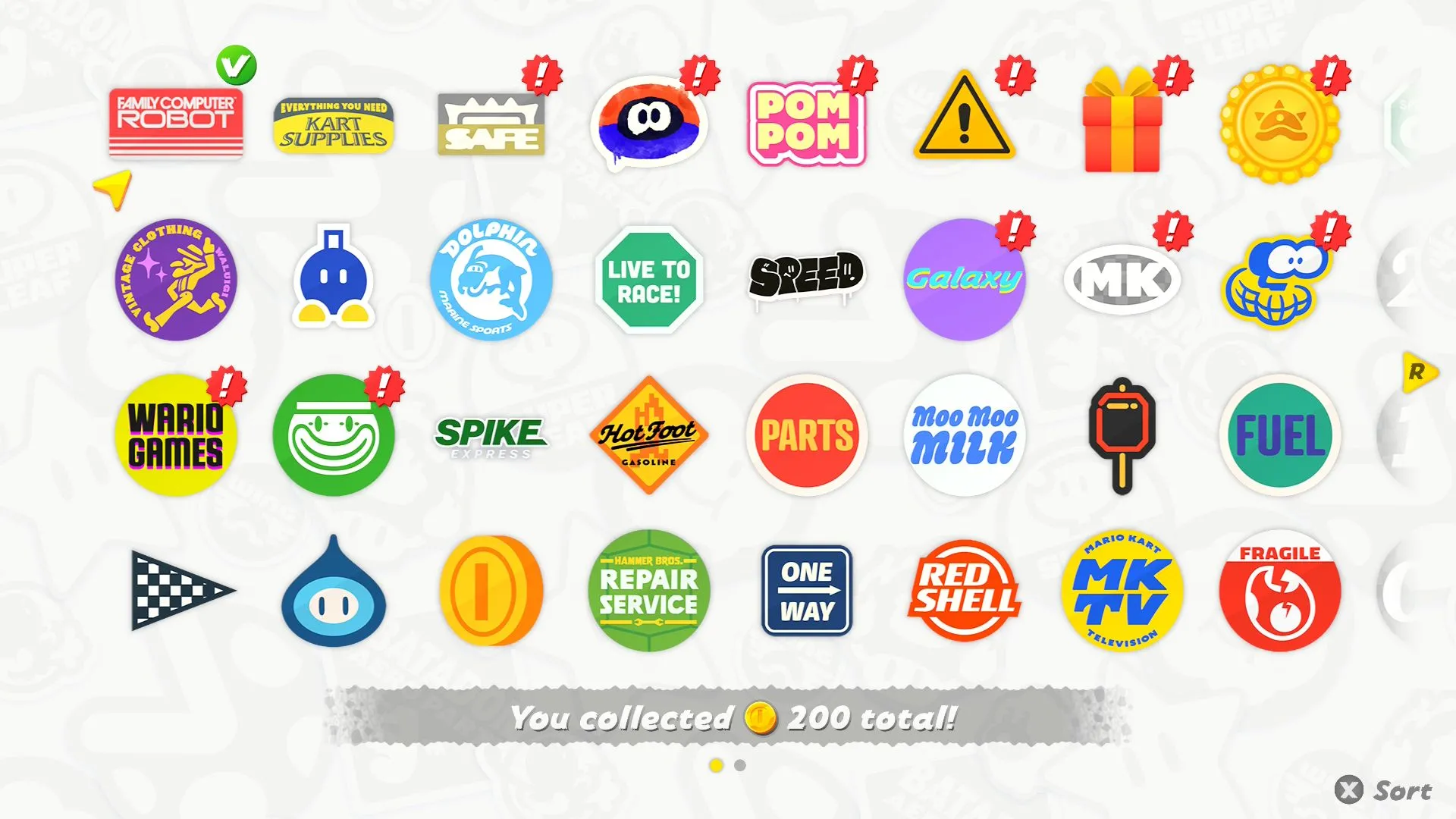 Màn hình hiển thị bộ sưu tập Sticker nhận được từ các thử thách trong chế độ Free Roam của Mario Kart World.