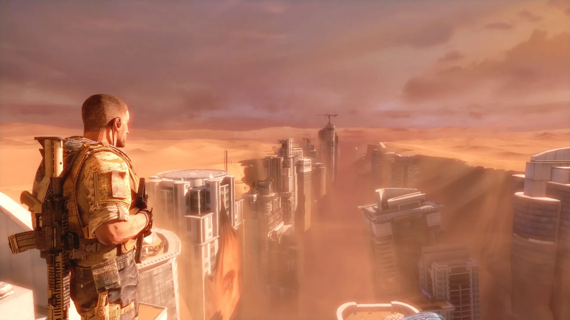 Màn hình trò chơi Spec Ops: The Line gốc, thể hiện bối cảnh chiến tranh ở sa mạc và đồ họa đặc trưng của game bắn súng góc nhìn thứ ba trên Xbox 360.