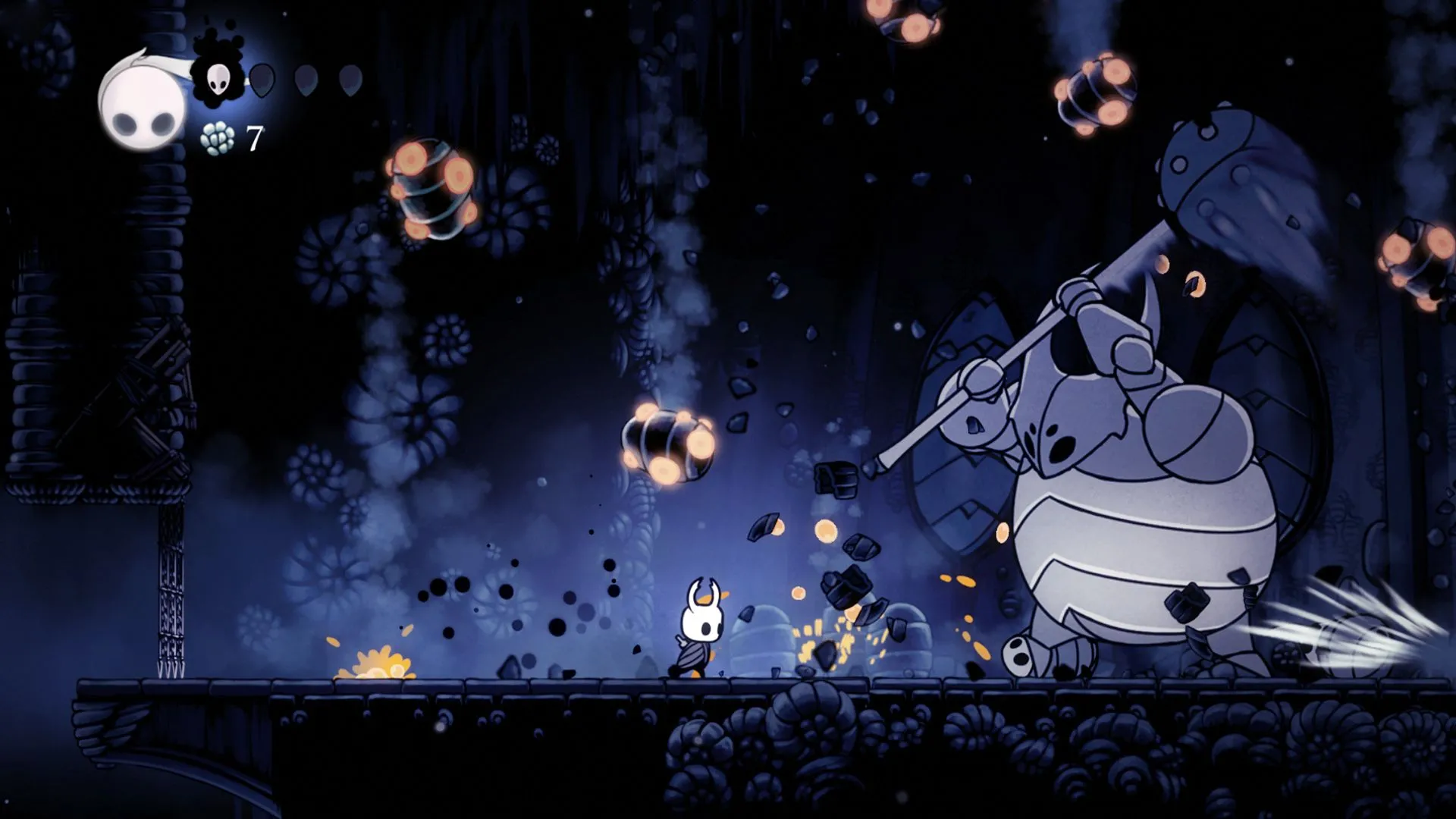 Một sinh vật nhỏ giống côn trùng đối mặt với trùm lớn trong Hollow Knight, đặc trưng của thể loại Metroidvania khám phá