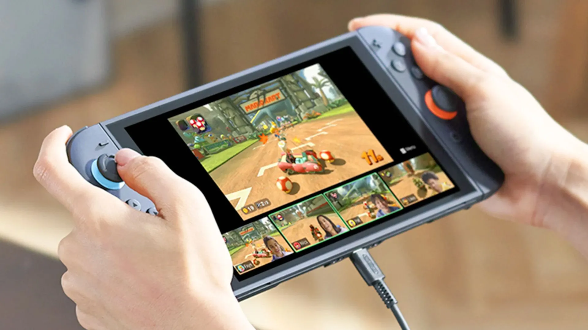 Người dùng đang chơi Switch 2 ở chế độ cầm tay, hiển thị màn hình sáng rõ.