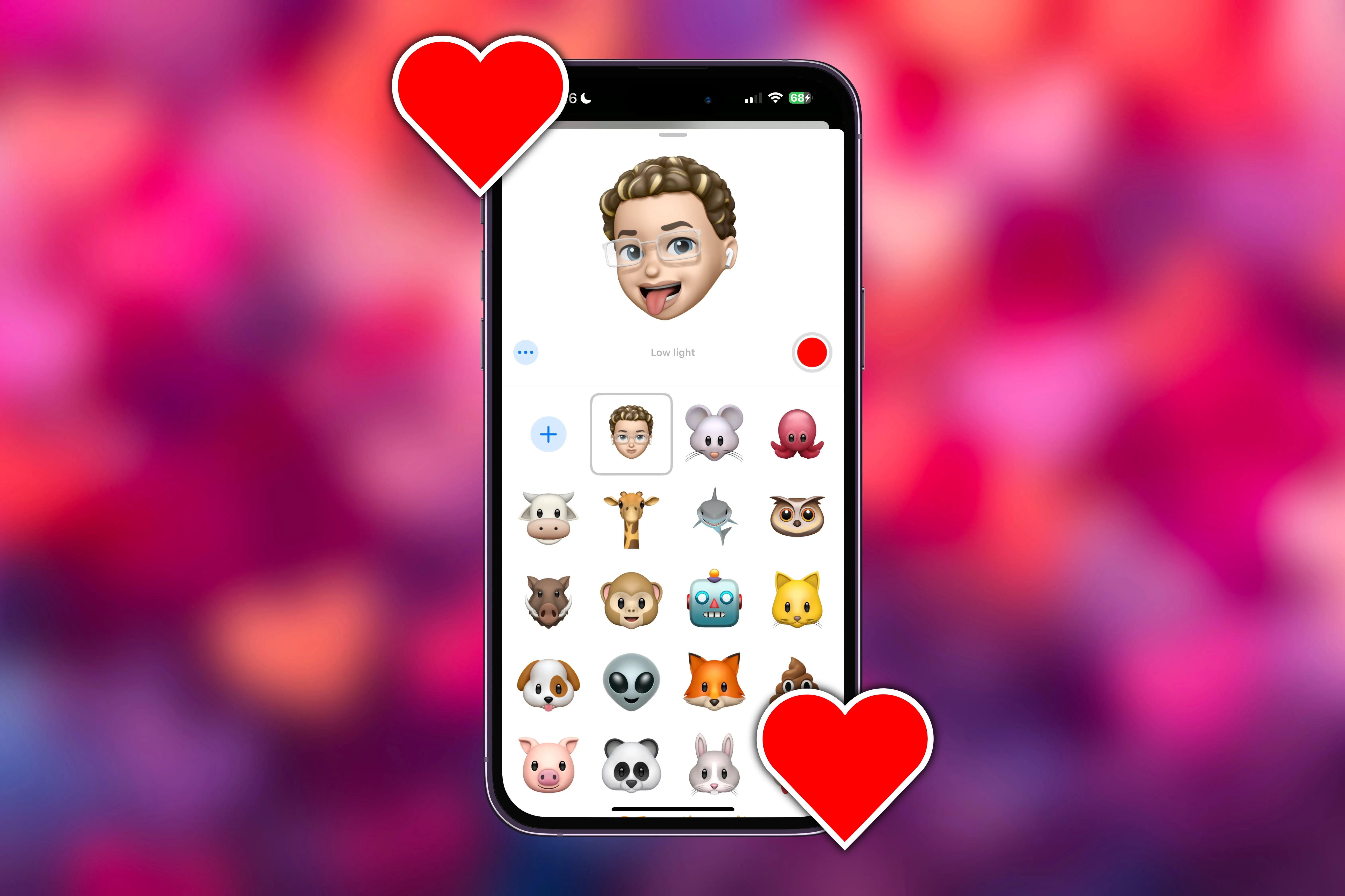 Quá trình tạo video Memoji trong ứng dụng iMessage trên iPhone, được bao quanh bởi các trái tim, giúp bạn gửi thông điệp yêu thương sinh động.